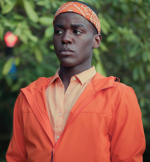 Sex Education S03 Eric Effiong Orange Jacket