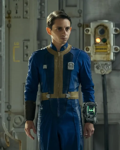 moises-arias-fallout-2024-blue-jumpsuit Moises Arias Fallout 2024 Blue Jumpsuit - Image 1