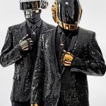 Daft Punk Costume – Premium black and gold costume with shimmering sequins, lapel collar, and open cuffs from USA Jacket Store.