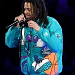 J. Cole 90s Char­lotte Hor­nets Blue Hooded Jack­et