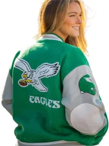 Back view of Kylie Kelce wearing the Philadelphia Eagles varsity jacket 
