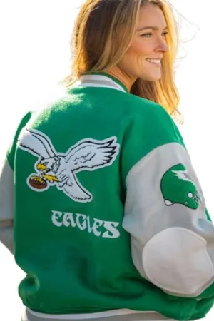 Back view of Kylie Kelce wearing the Philadelphia Eagles varsity jacket