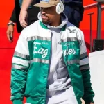 Jalen Hurts wearing the green and white Philadelphia Eagles bomber jacket – front pose