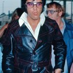 Elvis Presley wearing the Elvis Presley Long Coat at the L.A. Felt Forum.
