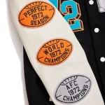 Close-up of Andrew x Miami Dolphins Jacket logo and stitching