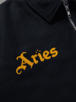 Close-up of Arsenal x Aries Wool Jacket logo and fabric texture