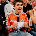 Shop the Timothee Chalamet Playoffs Avirex Jacket in Orange