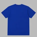 Taylor Swift wearing a Stevie Knicks Blue T-Shirt courtside at Game 4 of the NBA Finals at Madison Square Garden.