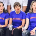 Taylor Swift wearing a Stevie Knicks Blue T-Shirt courtside at Game 4 of the NBA Finals at Madison Square Garden.